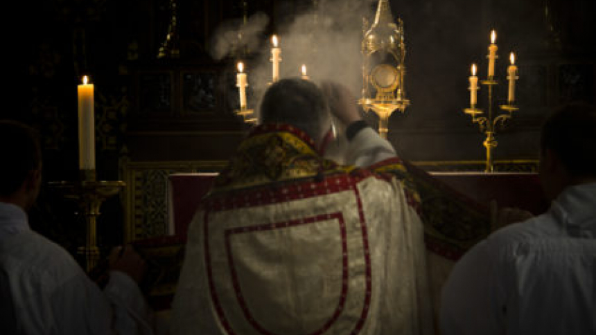 Priest in prayer