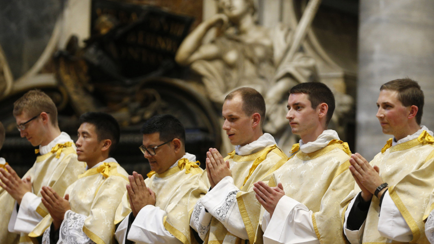 New deacons from the Pontifical North American College are pictured during their ordination in St. Peter's Basilica at the Vatican Sept. 29, 2022. Twenty-two seminarians from 17 U.S. dioceses and one from the Archdiocese of Sydney were ordained to the transitional diaconate. (CNS photo/Paul Haring)