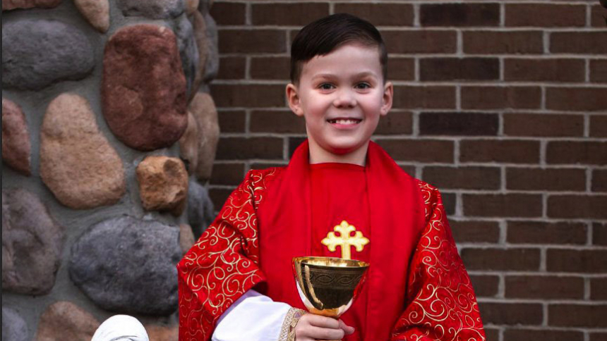 Nine-year-old Teddy Howell, seen in an undated photo, wants to be a podcaster and a priest.