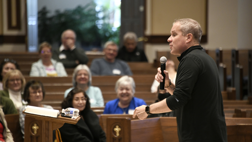 Author, radio personality and Life Teen executive Mark Hart (front) delivers a presentation "And their eyes were opened and they recognized Him," concerning God's grace, the Eucharist and overcoming fears to become an evangelist, on April 29 at St. John the Evangelist in St. John. (Anthony D. Alonzo photo)