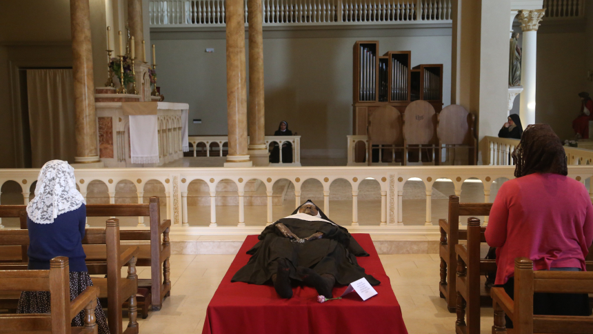 The exhumed body of Sister Mary Wilhelmina Lancaster, foundress of the Benedictines of Mary, Queen of Apostles, lies in repose in the church at the Abbey of Our Lady of Ephesus in Gower, Mo., May 21, 2023. (OSV News photo/Megan Marley)