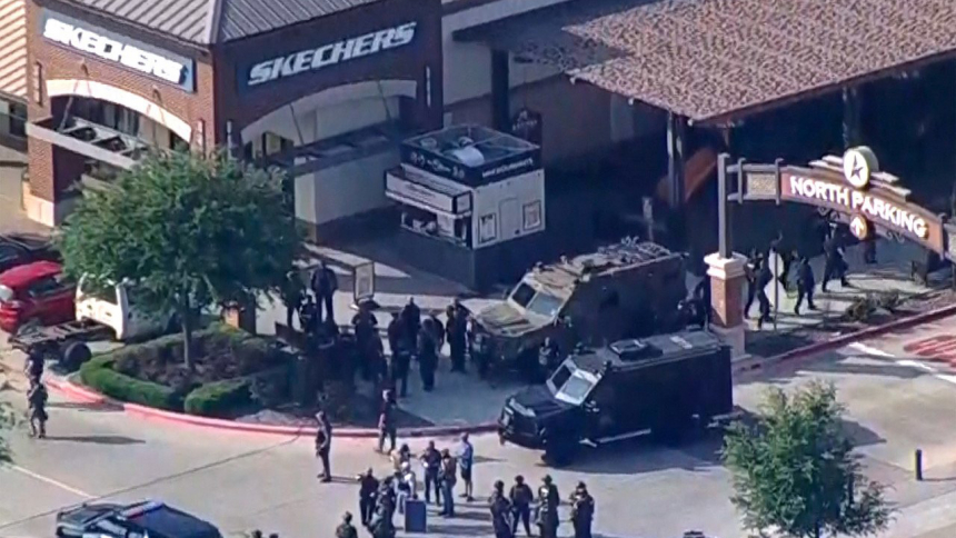 Police respond to a shooting in the Dallas area's Allen Premium Outlets May 6, 2023, in a still image from video. Hours later law enforcement said the shooter, who was killed by police, had left at least eight people dead and injured at least seven others.