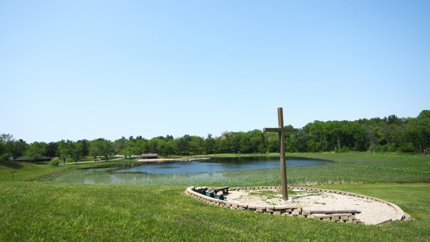 A large wooden cross stands atop a ridge at Camp Lawrence in Porter County on May 26. The diocesan retreat grounds, which opened in 1957, have been renovated and beautified in recent years to provide improved conference and camping experiences for the hundreds of guests who visit annually. (Anthony D. Alonzo photo) 