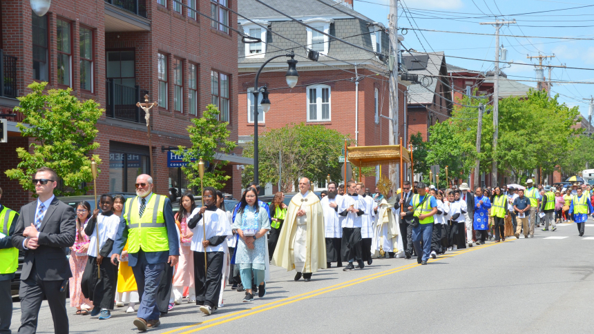 Father Seamus Griesbach, center in vestments, leads hundreds of parishioners in a Eucharistic procession through Portland, Maine, on Corpus Christi Sunday, June 11, 2023. The priest is rector of the Cathedral of the Immaculate Conception in Portland and pastor of three parishes. The procession helped the Diocese of Portland and other U.S. dioceses launch the parish year of the U.S. bishops' National Eucharistic Revival. (OSV News photo/courtesy Diocese of Portland)