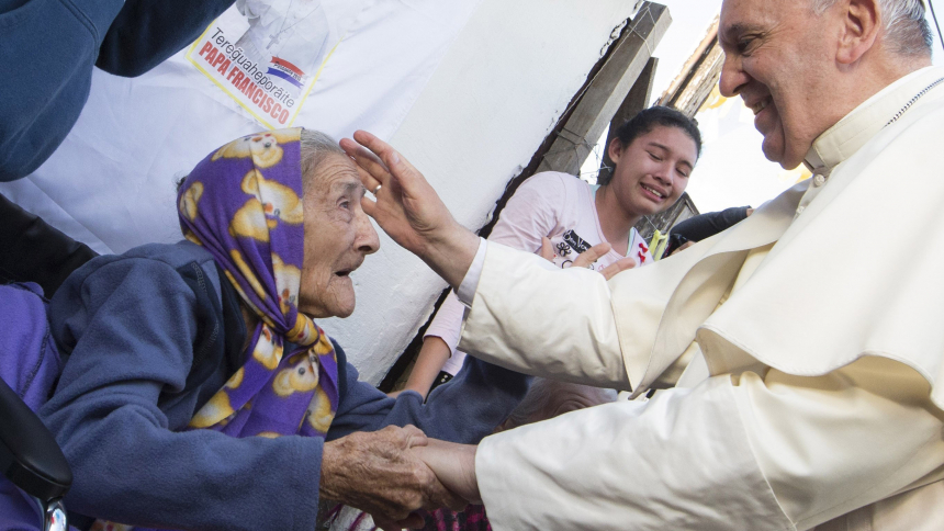 Pope Francis greets an elderly woman as he meets with people in Asuncion, Paraguay, in this July 12, 2015, file photo. The pope has chosen the theme, "In old age they will still bear fruit" (Psalm 92:15), for the second World Day for Grandparents and the Elderly July 24. (CNS photo/Paul Haring)