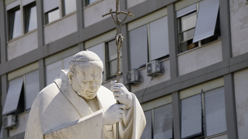 A statue of St. John Paul II is seen outside of Rome's Gemelli hospital June 8, 2023, where Pope Francis is staying after undergoing surgery to treat a hernia June 7. Because of his frequent visits over his three-decade pontificate, the Polish pope affectionately called the hospital "the third Vatican" after his second "home" at the papal summer residence in Castel Gandolfo outside of Rome. (CNS photo/Justin McLellan)