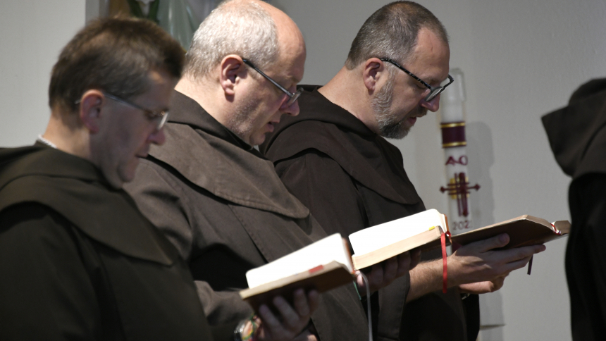 Discalced Carmelite Fathers including (left to right) Father Bronislaw "Bruno" Socha, O.C.D.,  Second Councilor Father Franciszek “Francis” Czaicki, O.C.D. and Prior Father Andrzej “Andrew” Gbur, O.C.D. pray the Litany of the Hours in the Chapel of Our Lady of Mercy in Munster on June 30. Serving Region faithful since the World War II era, the Polish-born priests and brothers assist local clergymen with sacramental duties and, on their picturesque monastery grounds, host Masses, Confessions and cultural cel