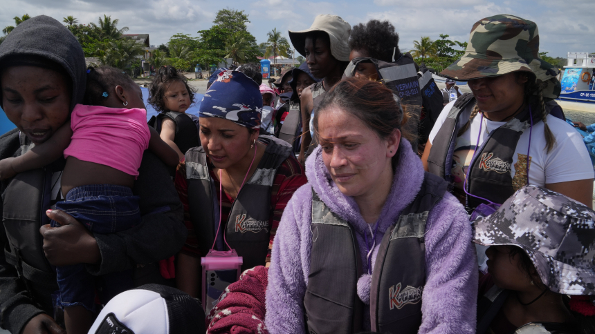 Migrants from Venezuela and Haiti get ready to board a boat in Necoclí, Colombia, April 28, 2023. (OSV News photo/Manuel Rueda, Global Sisters Report)