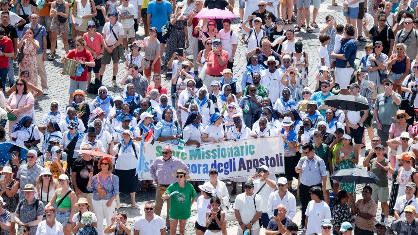 Visitors gather in St. Peter's Square at the Vatican to pray the Angelus with Pope Francis July 16, 2023. (CNS photo/Vatican Media)