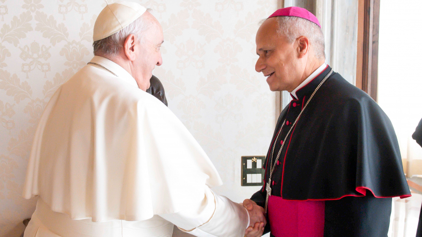 Pope Francis greets Archbishop Robert F. Prevost, a Chicago native, during a private audience at the Vatican Feb. 12, 2022.  The pope will elevate Cardinal-designate Prevost, who is prefect of the Dicastery for Bishops, to the College of Cardinals during a special consistory at the Vatican Sept. 30. (CNS photo/Vatican Media)