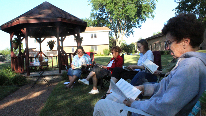 Next to the gazebo that graces the parish campus, the Summer Gazebo Reflections group at St. Helen in Hebron has been meeting this summer to discuss the "Holy Moments" described in the book of the same name by Catholic author Matthew Kelly. Led by Laura Roeske (from left), the group on July 10 included Cathy Mezzacapo, Dawn Mayhew, Jackie Reed (not shown) and Pat Hren, all St. Helen parishioners. The final sessions are set for 6:30 p.m. on Mondays, Aug. 7 and 21. (Marlene A. Zloza photo)