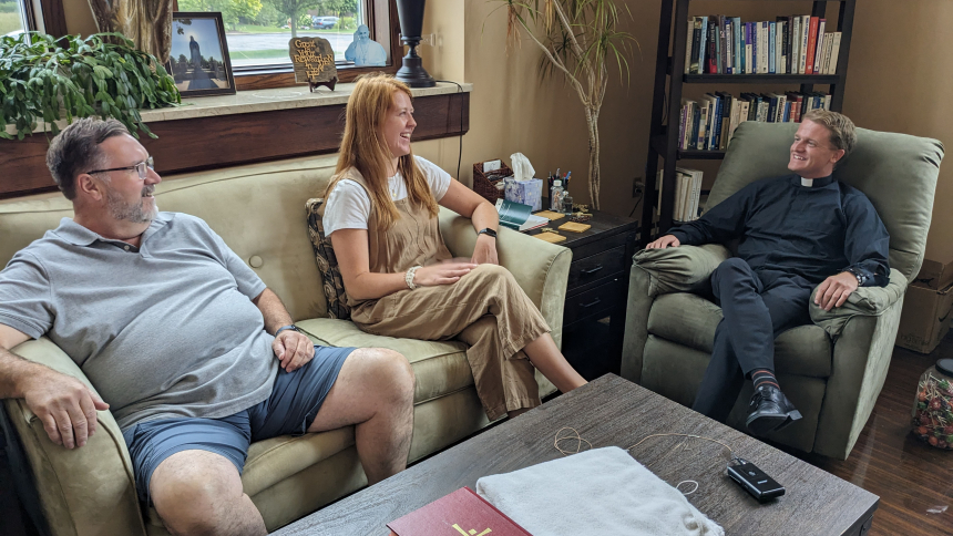 Katherine Carlson joins Keith Burke, service and outreach coordinator, and Father Declan McNichols on Aug. 8 at St. John the Evangelist. The trio is planning opportunities for parish partners to go on mission trips domestically and internationally. (Lynda J. Hemmerling photo)