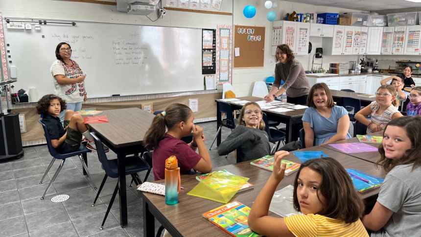 Nativity of Our Savior in Portage began its family catechism classes for this school year on Sept. 10. Students report to their assigned classrooms while parents attend a meeting in the school gym monthly. Pictured is catechist Patty Martinez Castro and her aide Diane Belcher leading a lesson for fifth graders. (Provided photo)