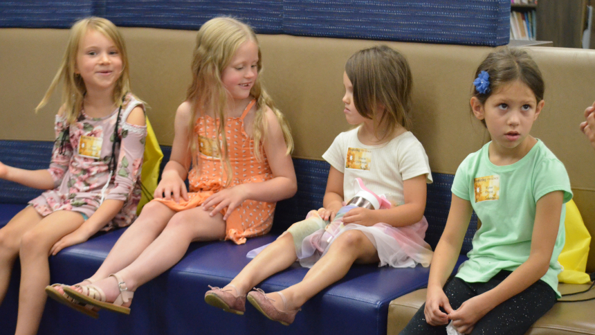 Children including Josie Schwartz, Colette Ummel, Grace Usdowski and Rylee Krupa wait to participate in the a portion of the Catechesis of the Good Shepherd program during the Diocese of Gary event that focused on the Eucharistic Presence at Bishop Noll on Aug. 26. (Erin Ciszczon photo)