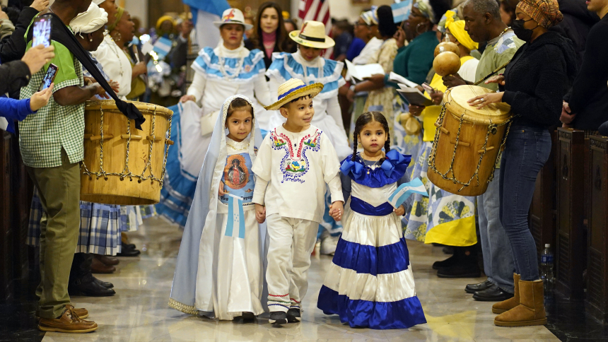 Children dressed in traditional clothing arrive in procession for a Spanish-language Mass celebrated in honor of Our Lady of Suyapa, patroness of Honduras, at St. Patrick's Cathedral in New York City Feb. 5, 2023. (OSV News photo/Gregory A. Shemitz)