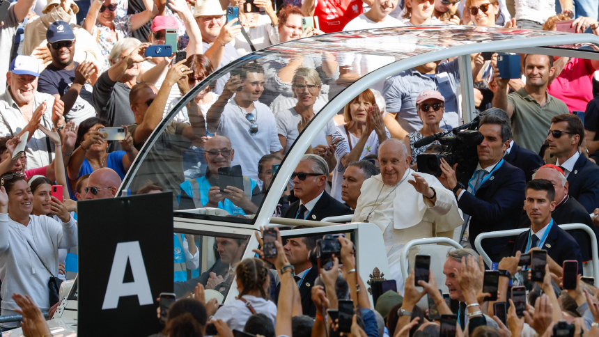Pope Francis greets the crowd from the popemobile as he arrives for Mass at the Vélodrome Stadium in Marseille, France, Sept. 23, 2023. (CNS photo/Lola Gomez)