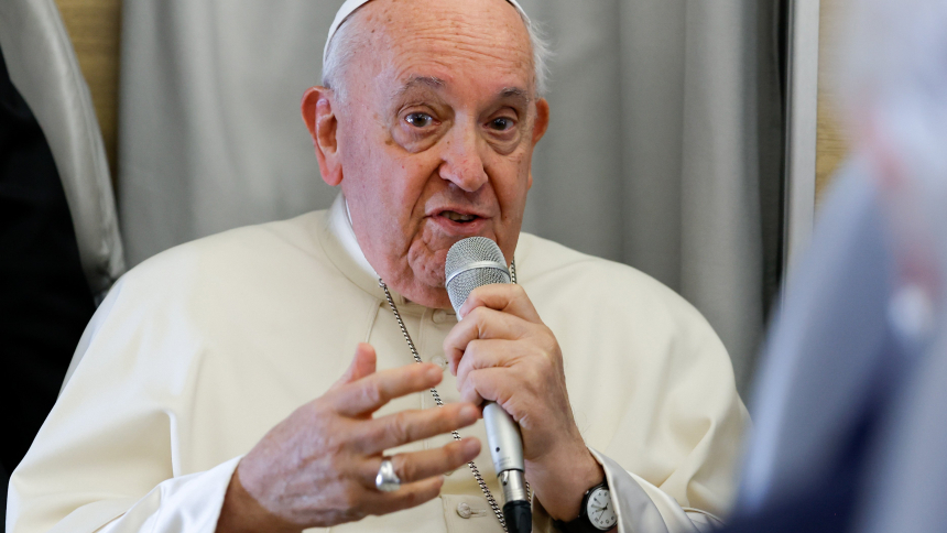 Pope Francis answers questions from journalists aboard his flight back to Rome from Ulaanbaatar, Mongolia, Sept. 4, 2023, after a four-day visit to the Asian country. (CNS photo/Lola Gomez)