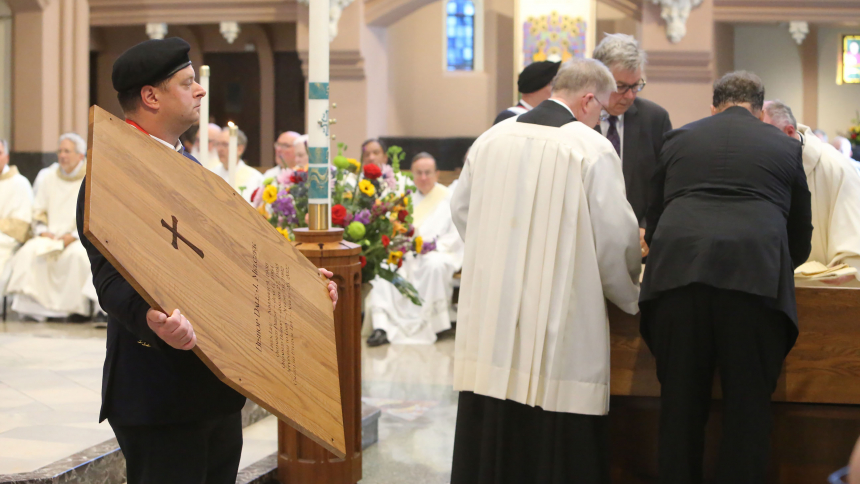 Fourth degree Knights of Columbus member Patrick Glavan (left) holds the casket cover during funeral services for  Bishop Dale J. Melczek on Aug. 29, 2022 at the Cathedral of the Holy Angels in Gary. Glavan, a St. John resident and member of the Abraham Lincoln assembly 235, was appointed on Sept. 1 as the master of the Indiana district, leading men of the fourth degree throughout the state. (Northwest Indiana Catholic file photo)