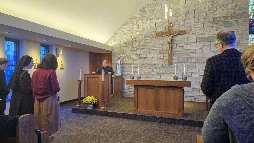 The Most Rev. Robert McClory, Bishop of the Diocese of Gary, conducts the Workplace Enthronement of the Sacred Heart of Jesus Oct. 18 at Franciscan Health Munster.