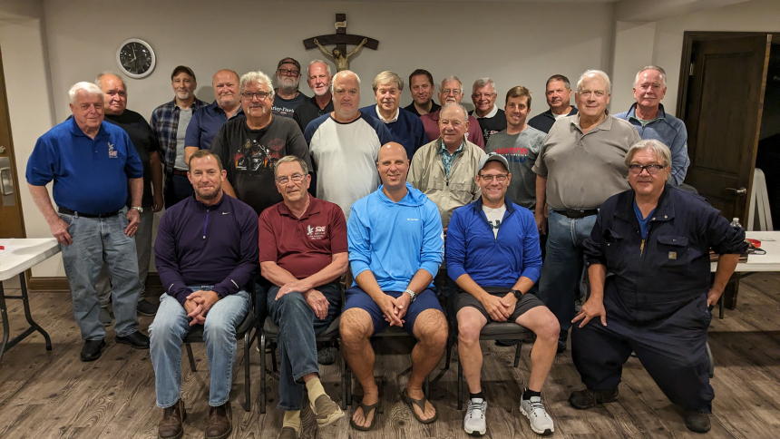 Members of the St. John the Evangelist Men's Club met Sept. 7 in Trinity Hall for a regular meeting. The social organization, which meets for dinner and comradery, regularly host fundraisers to donate money to the parish and community. (Lynda J. Hemmerling photo) 
