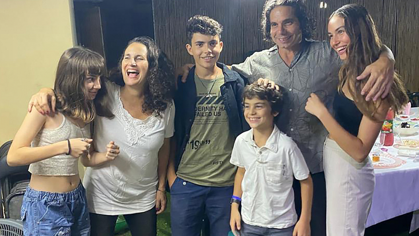 Hadas, second from left, and Ofer Kalderon, second from right, pose in an undated family photo in Kibbutz Nir Oz, Israel, with their four children, from left, Sahar, now 16; Rotem, 19; Erez, 12; and Gaia, 21. Sahar and Erez along with their father were taken hostage by Hamas Oct. 7, 2023, and Hadar has received no word of their fate. They were not in any of the three groups released by Hamas Nov. 24-26. Her mother and niece have been reported murdered in Gaza. (OSV News photo/courtesy Hadas Kalderon) Editor