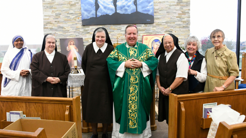 Bishop Robert J. McClory (center) stands with jubilarian religious (left to right) Sister Maria Jyoti, M.C., Sister Angela Mellady, O.S.F., Sister Julie Marie Oxley, O.S.F., Sister M. Rachel Dinet, O.S.F., Sister Angeline Benz, S.F.C.C., and Sister Gloria Jean Kozlowski, S.S.J.-T.O.S.F. as nuns working in the diocese are gathered at the Eucharistic Liturgy in Thanksgiving for Women Religious on Oct. 25 at St. Matthias parish. Sisters celebrating milestone anniversaries of religious life were presented with 