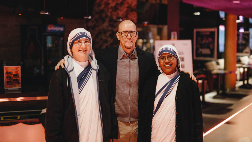 James Wahlberg, producer of "Mother Teresa: No Greater Love" poses with Sister Szymona and Sister Jose Mercy of the Missionaries of Charity at the documentary's premiere in Radom, Poland, Oct. 19, 2023. Wahlberg, brother of Hollywood actor Mark Wahlberg, was serving time in prison as a convicted drug addict when when Mother Teresa paid a visit in 1988 and changed his life. (OSV News photo/Sebastian Nycz, courtesy Knights of Columbus)