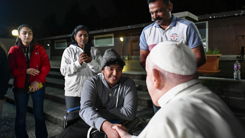 Pope Francis greets families living at "Hospitality Village," an apartment complex that is part of the parish of St. Mary, Mother of Hospitality, on the eastern outskirts of Rome, Nov. 17, 2023. (CNS photo/Vatican Media)