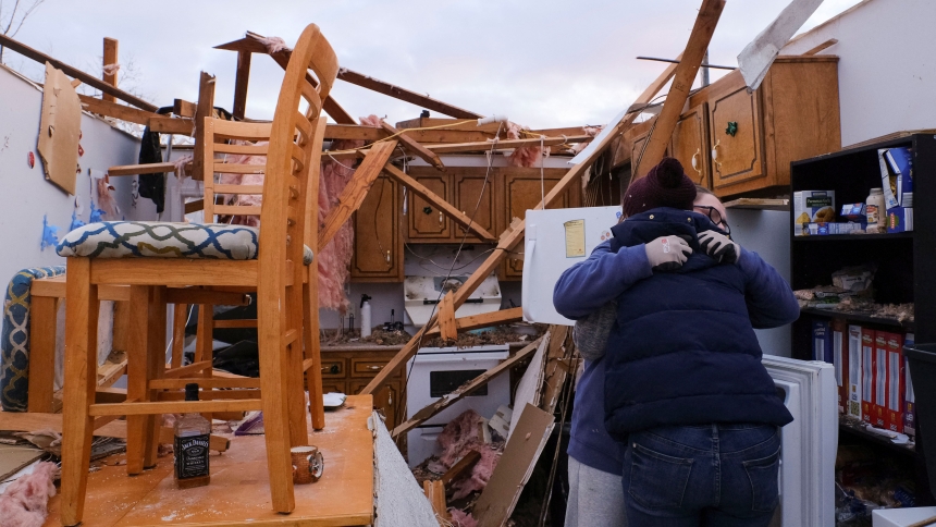 Ally Nelson, who lost everything in her home, is consoled by Jonelle Brooks in Clarksville, Tenn., Dec. 10, 2023, after a tornado swept through the town. Tennessee officials are assessing the damage after tornadoes and strong thunderstorms roared across the state Dec. 9, leaving at least six people dead, dozens injured, multiple buildings destroyed and power outages. (OSV News photo/Kevin Wurm, Reuters)