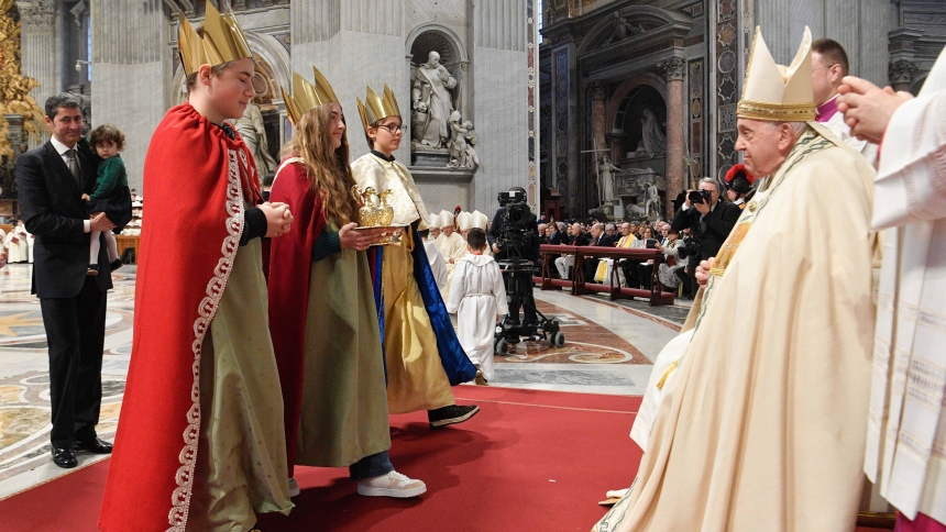 Pope Francis greets children dressed as the Magi as he accepts the offertory gifts during Mass for the feast of Mary, Mother of God, and World Peace Day on New Year's Day in St. Peter’s Basilica at the Vatican Jan. 1, 2024. (CNS photo/Vatican Media)