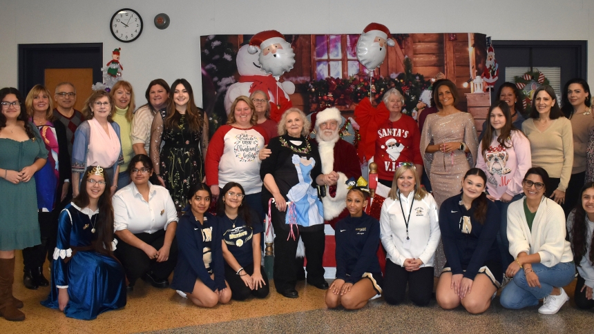 At Bishop Noll Institute, school friends and family gather for a princess brunch coordinated by alumni Dee Dee Buck (seated, left of Santa) and her husband, George Buck (left) in December. During the event to benefit BNI, more than 90 princesses and those they accompanied were part of the storybook meal, an example of recent efforts by BNI graduates to support thier alma mater. (provided photo)
