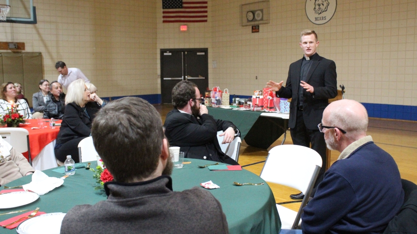 Father Nate Edquist, vocations director for the Diocese of Gary, spoke at the Dec. 29 Serra Club dinner  at St. Bridget, summarizing a discernment retreat attended by 11 young men and hosted by the 12 current seminarians at the Cedar Lake Conference Center on Dec. 27-29. "We used a video series and discussion group (to discuss the priesthood)," said Father Edquist, adding that one discerner is currently applying for the seminary, while several others have expressed an interest. (Marlene A. Zloza photo)