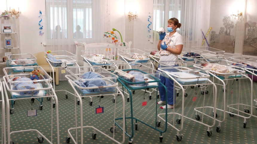 A nurse and newborns are seen in the Hotel Venice in Kyiv, Ukraine, May 14, 2020, which is owned by BioTexCom, a surrogacy agency. Pope Francis told diplomats Jan. 8, 2024, that he finds surrogacy "deplorable" and would like to see the practice universally banned. (OSV News photo/Gleb Garanich, Reuters)  