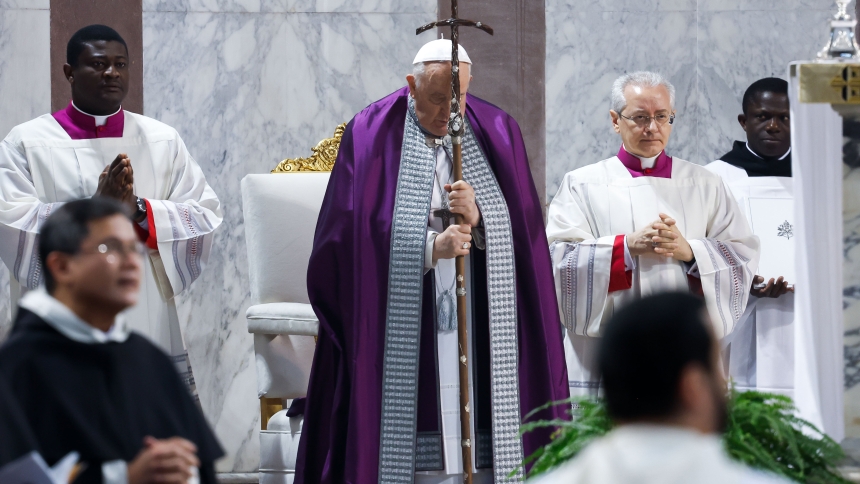 Pope Francis holds his crosier as the Gospel is read during his Ash Wednesday Mass at the Basilica of Santa Sabina in Rome Feb. 14, 2024. (CNS photo/Lola Gomez)
