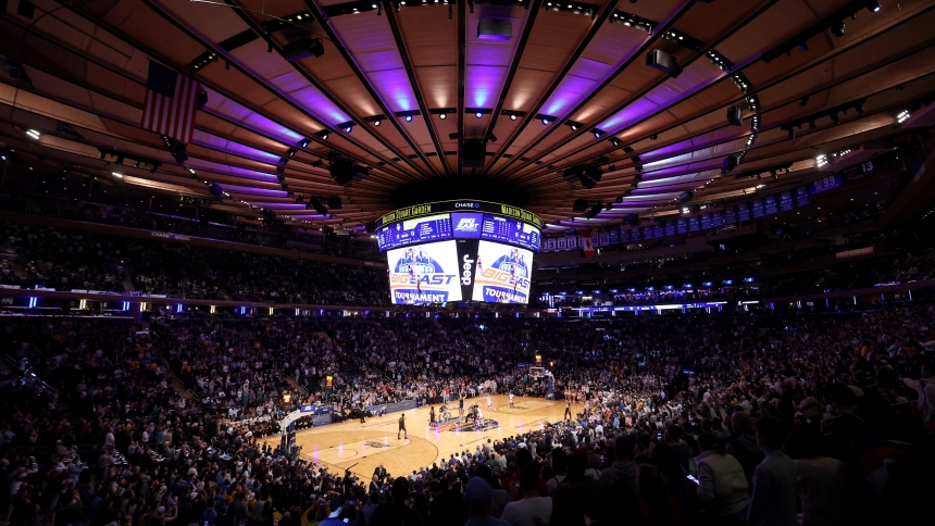 Players battle for the ball at the opening tip-off between the Marquette Golden Eagles and the Connecticut Huskies at Madison Square Garden in New York City March 16, 2024. The Golden Eagles are one of seven Catholic schools who made the cut for the 2024 Men's basketball NCAA tournament, which starts when the "First Four" play-in games on March 19. Mandatory Credit: (OSV News photo/Brad Penner-USA TODAY Sports via Reuters)