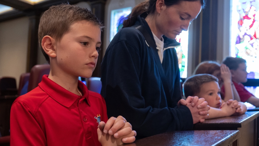 Joshua, Jessica, Jonathan, Lillian and Lucas Dahlberg pray together during Eucharistic adoration at Epiphany in Coon Rapids, Minn., May 2, 2024. They pray once a week at the chapel. Joshua began a remarkable recovery from a debilitating illness hours after he received his first Communion May 13, 2023. (OSV News photo/Dave Hrbacek, The Catholic Spirit)