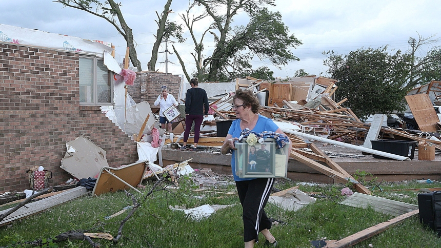 Volunteers clean up in Nevada, Iowa, May 21, 2024, after a tornado touched down the previous day. Iowa State Police confirmed a number of people had died May 21 in the town of Greenfield, a community of about 2,000 people 40 miles southwest of Des Moines. (OSV News photo/Nirmalendu Majumdar/Ames Tribune/USA Today Network via Reuters)