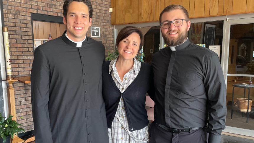 Luis Reyes, originally from Bucaramanga, Columbia, stands at Father Robert Ross’s first Mass at St. Stephen the Martyr, in Merrillville, in June of 2023, with Amy O'Donnell and her son, William O'Donnell, who is on the path to ordination for the priesthood in June 2026. Reyes has become like an adopted son and a brother to the O'Donnell family. (Provided photo)