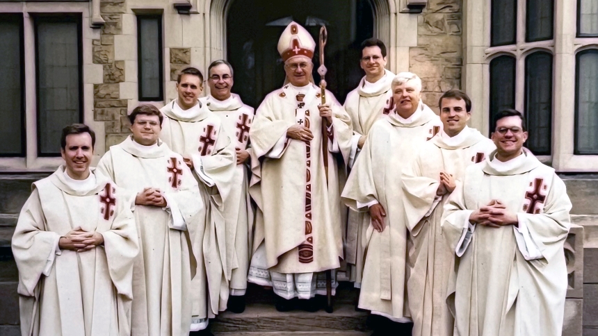 The Sacred Heart Major Seminary priestly ordination class of 1999 gathers with Cardinal Adam J. Maida (center) in Detroit. Then-Father Robert McClory stands at bottom, left. (Archdiocese of Detroit photo)