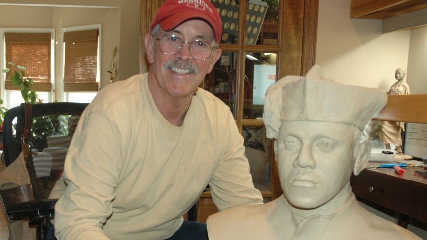 Forrest Tucker poses next to a clay bust of Father Augustus Tolton, at his home in Danville, Ind., March 20, 2024. Father Tolton, a candidate for sainthood, is the first recognized priest of African descent in the United States. He was declared "venerable" by Pope Francis in 2019. (OSV News photo/John Shaughnessy, The Criterion)