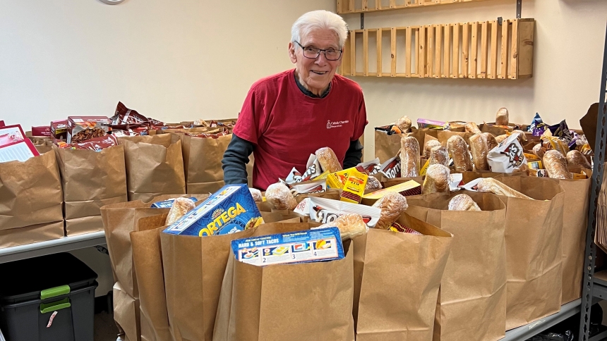 Jack Halton, 92, of Highland, is ready to fill more bags of groceries for food pantry clients at Catholic Charities Diocese of Gary, where he has been a volunteer for five years. Halton was recently named Volunteer of the Year by Catholic Charities USA. (Provided photo)
