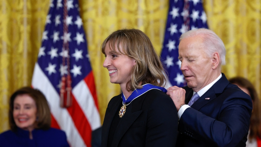 U.S. President Joe Biden presents the Presidential Medal of Freedom to Olympic champion swimmer Katie Ledecky, a Catholic, during a ceremony at the White House in Washington May 3, 2024. (OSV News photo/Evelyn Hockstein, Reuters)