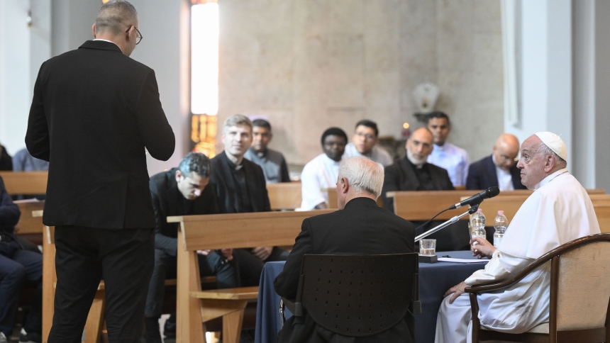 Pope Francis listens to a question during a meeting with priests ministering in the Diocese of Rome who have been ordained 10 years or less in the Church of Jesus the Divine Master May 29, 2024. (CNS photo/Vatican Media)