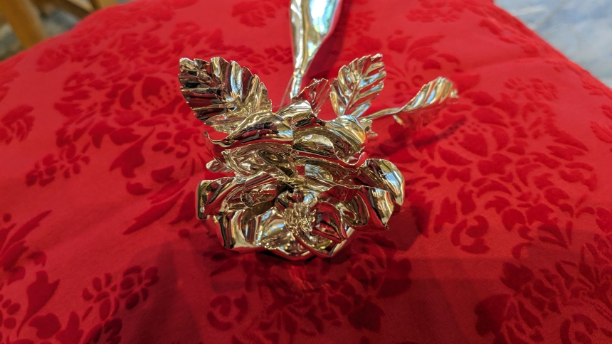 One of eight silver roses that are traveling to Mexico this month was on display April 30 in the chapel at St. Michael the Archangel in Schererville. It is part of an international Silver Rose Prayer Service honoring Our Lady of Guadalupe and the sanctity of life, dating back to 1960. (Lynda J. Hemmerling photo)
