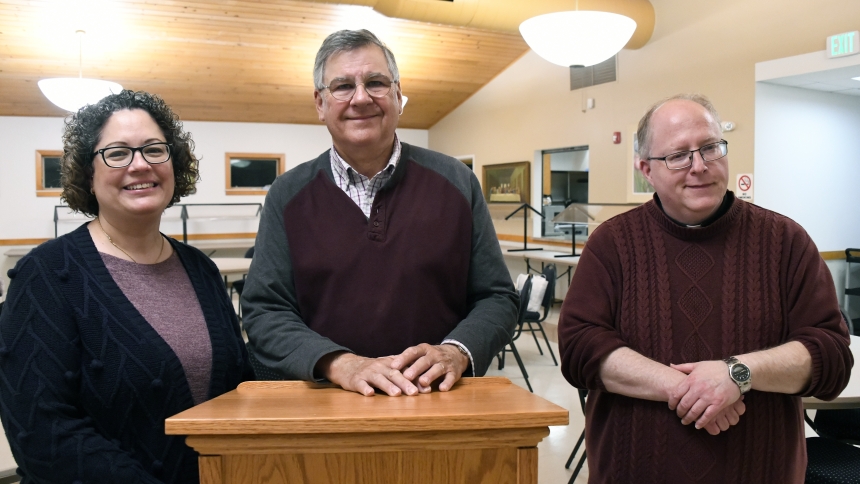 At Holy Family Parish's Sacred Heart campus in LaPorte, hosts of a marriage tribunal talk (left to right) diocesan staff member Milly Virus, Deacon Frank Zolvinski, and Father Brian Chadwick, diocesan judicial vicar, gather after the presentation on April 25. The main topic of discussion, annulments, were examined through the Catholic canonical lens, which allows a process for faithful or those seeking to join the Church remedy when relational bonds end and life moves forward. (Anthony D. Alonzo photo) 