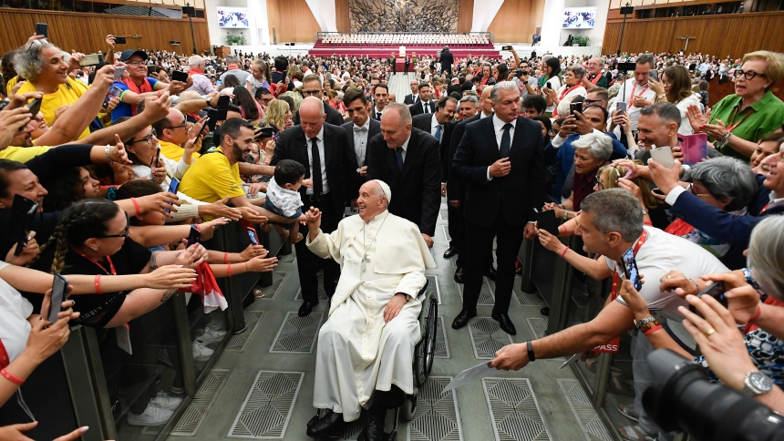 Pope Francis greets participants in an international meeting of parish and diocesan choirs in the Paul VI Audience Hall at the Vatican June 8, 2024. (CNS photo/Vatican Media)