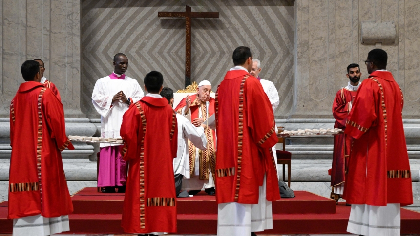 Pope Francis blesses palliums - woolen bands worn by metropolitan archbishops to symbolize their authority and unity with the pope - during Mass for the feast of Sts. Peter and Paul in St. Peter's Basilica at the Vatican June 29, 2024. (CNS photo/Vatican Media)