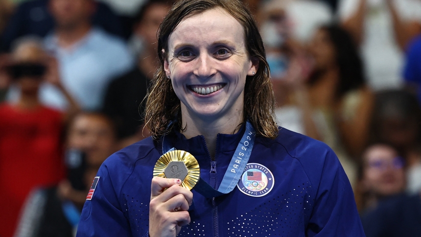 Katie Ledecky of United States celebrates on the podium after wining her ninth Olympic gold medal during the women's 800-meter freestyle Aug. 3, 2024, at Paris La Defense Arena. Ledecky is a graduate of Stone Ridge School of the Sacred Heart in Bethesda, Md. (OSV News photo/Evgenia Novozhenina, Reuters)