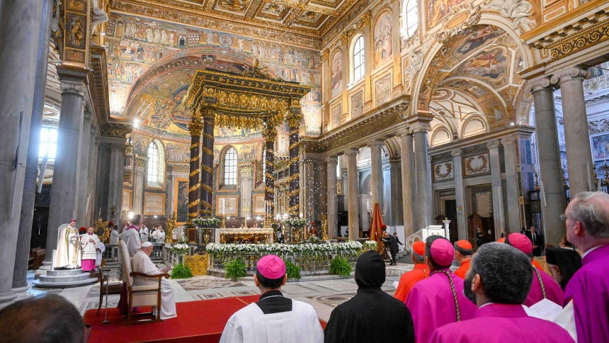 Pope Francis watches white rose petals falling from the ceiling of Rome's Basilica of St. Mary Major Aug. 5, 2024, for evening prayer on the feast of the basilica's dedication. According to tradition, on Aug. 5, 358, Mary had snow fall to mark the spot on Rome's Esquiline Hill where she wanted a church built in her honor. (CNS photo/Vatican Media)