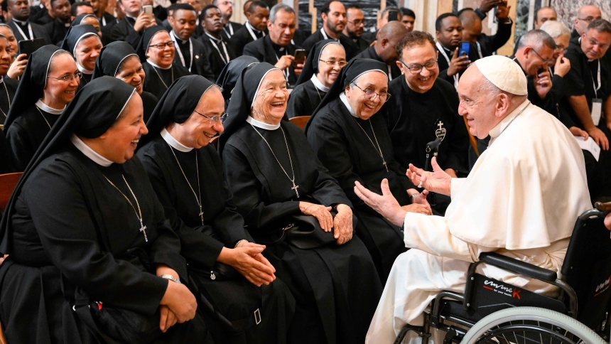 Pope Francis shares a moment with members of the Sisters of the Presentation of Mary during a meeting at the Vatican Aug. 12, 2024, with members of four religious orders holding their general chapter meetings in Rome. (CNS photo/Vatican Media)